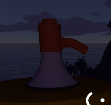 A grey-and-red megaphone on a round platform at night