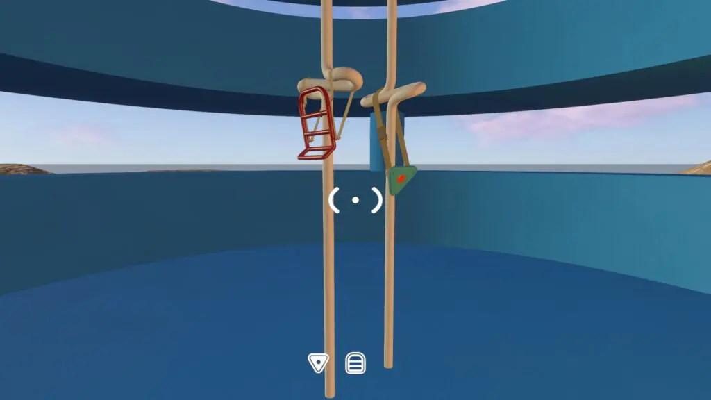 A red backpack and small hip bag hang from hooks inside a blue circular room