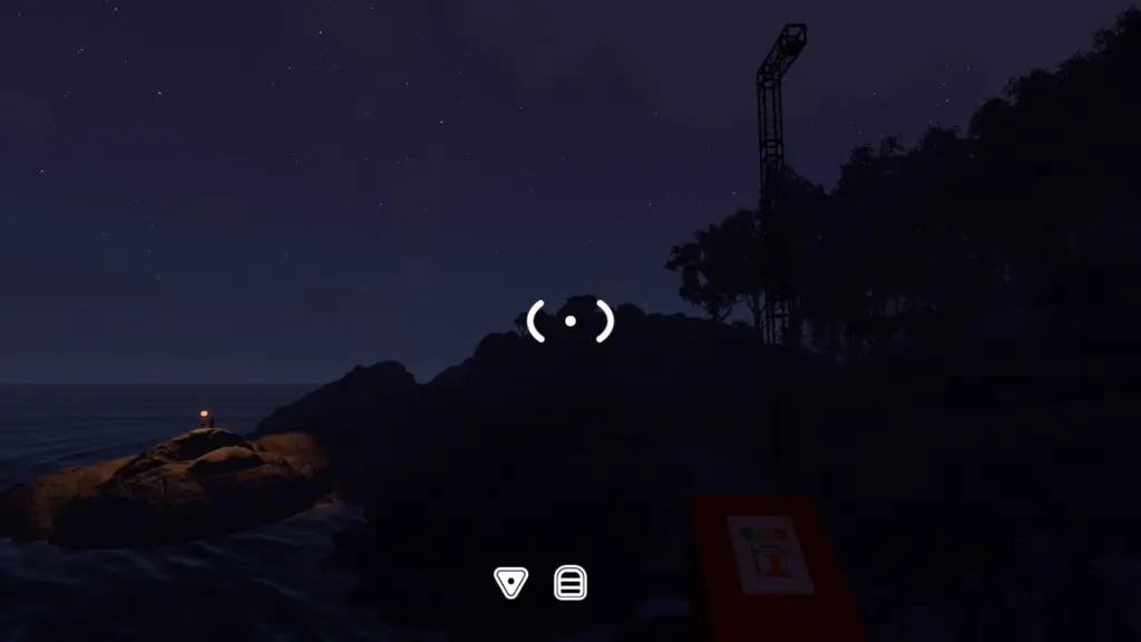 The tall coastal crane is silhouetted above a switch station at night