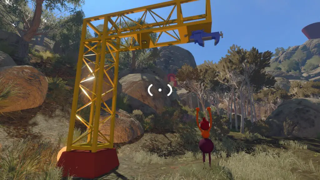 A player holds the released red control-panel piece beneath the yellow crane