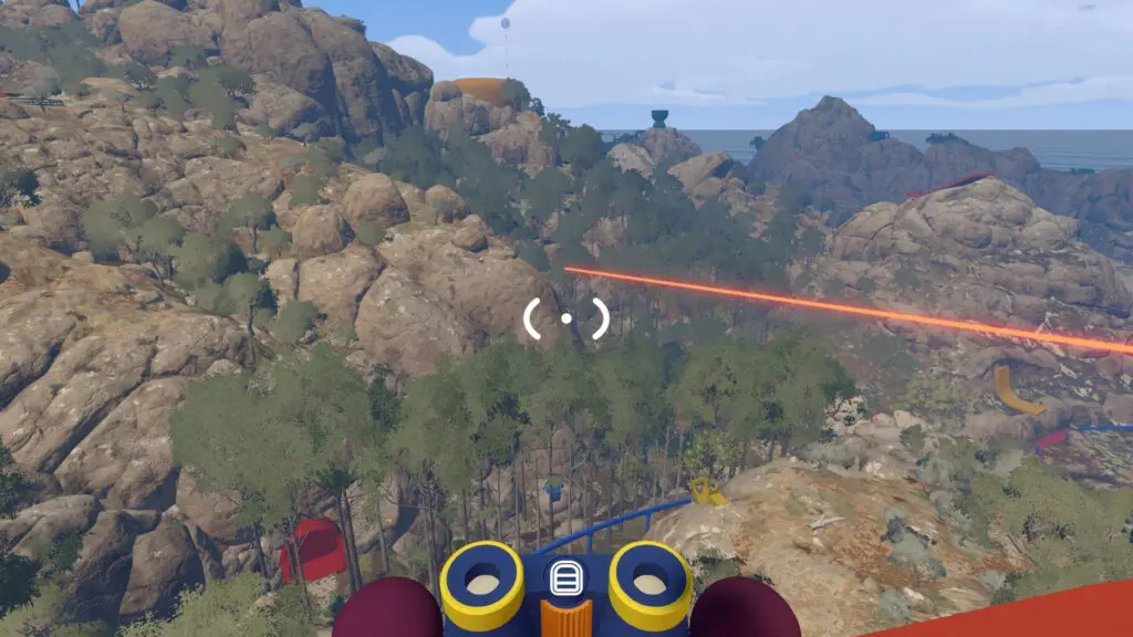 Binoculars from Red Tower look toward the wooded heavy-ball relay area