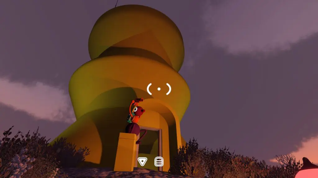 The bulb-shaped Yellow Tower and its control-panel entrance at dusk