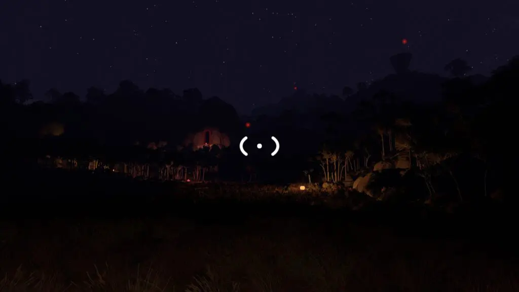 Several red fixed-radio beacon lights are visible across the island at night